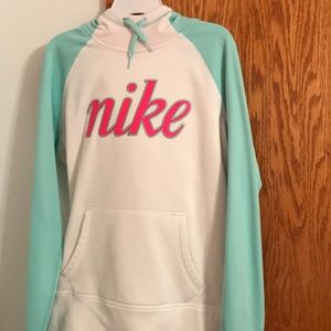 Nike hoodie that is mint green and pink